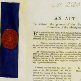 Detail showing the red seal and title page of the Aborigines Act 1910 (Vic).